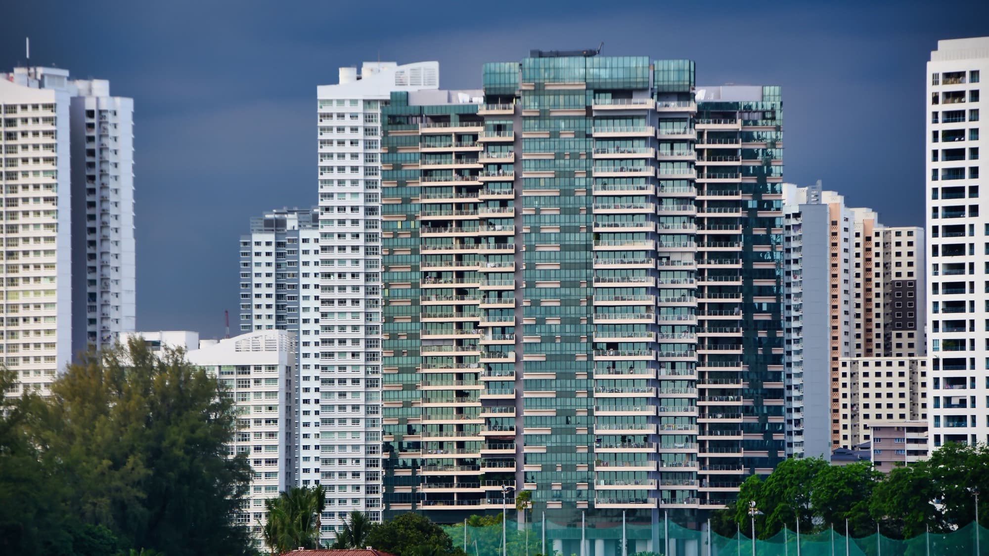 Private condominium towers in Singapore seen from below