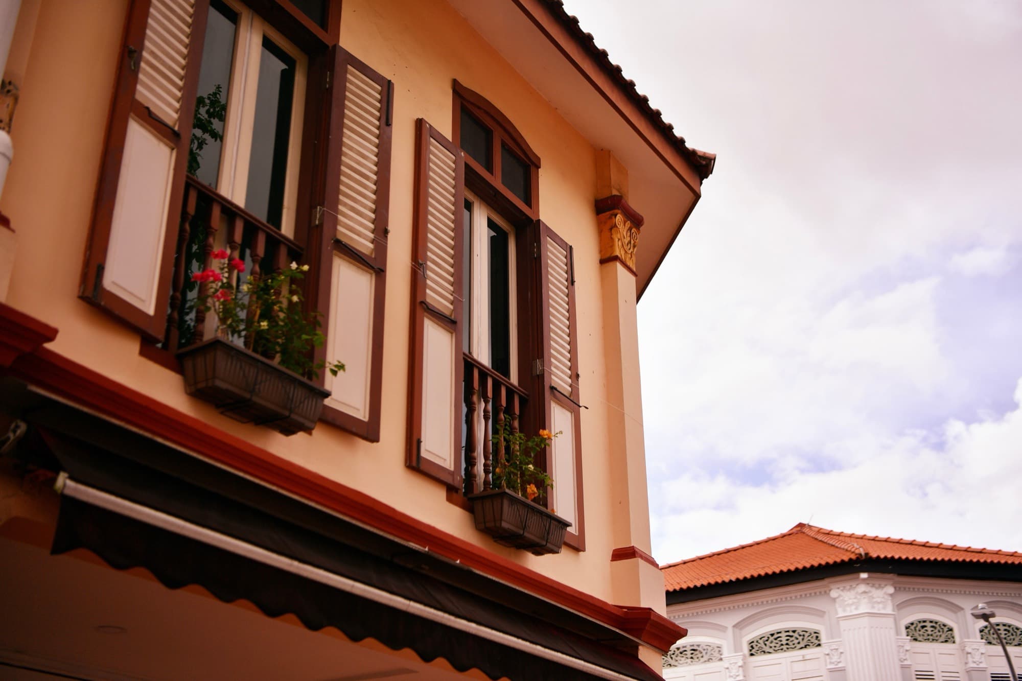 Colourful conserved shophouses in a Singapore heritage district